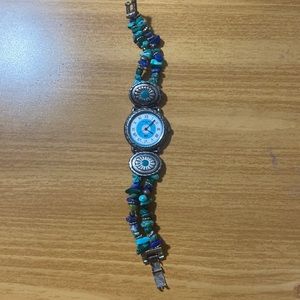 Different shades of greens and blues, silver metal